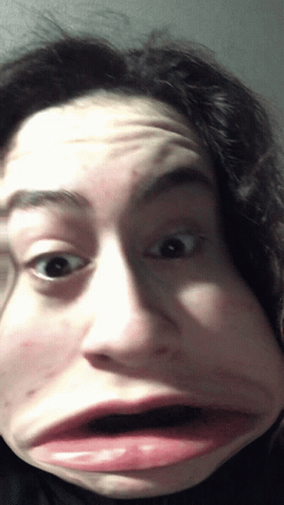 Woman Making Funny Face With Mouth Open GIF