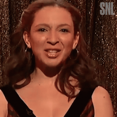 Woman Making Funny Face With SNL Logo GIF