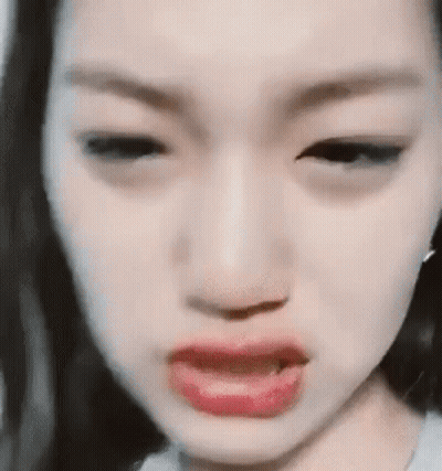 Woman Making Funny Face With Tongue Out GIF