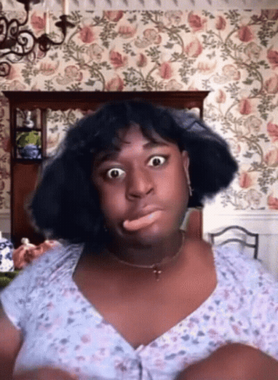 Woman Making Funny Face With Tongue Out GIF