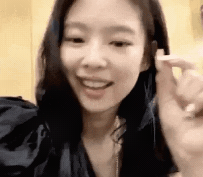 Woman Making Heart With Hands GIF