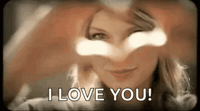 Woman Making Heart With Hands Saying I Love You GIF