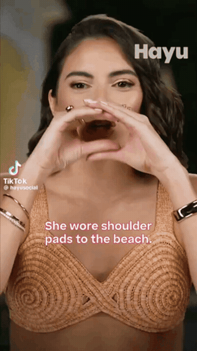 Woman Making Heart With Hands She Wore Shoulder Pads To The Beach GIF