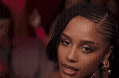 Woman Making Peace Sign GIF