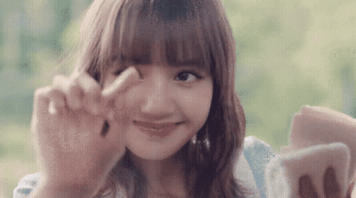 Woman Making Peace Sign GIF