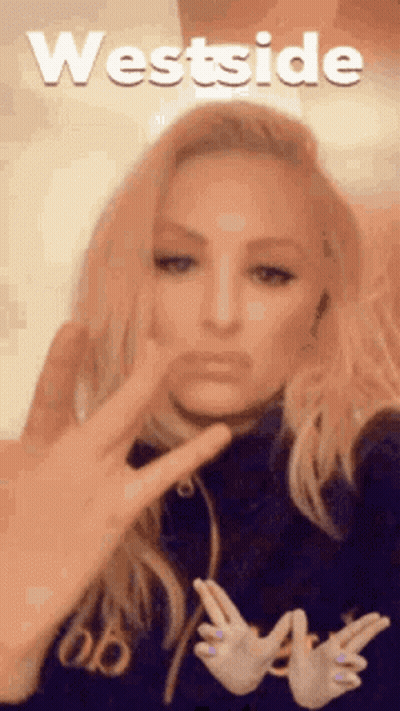 Woman Making Peace Sign With Westside GIF