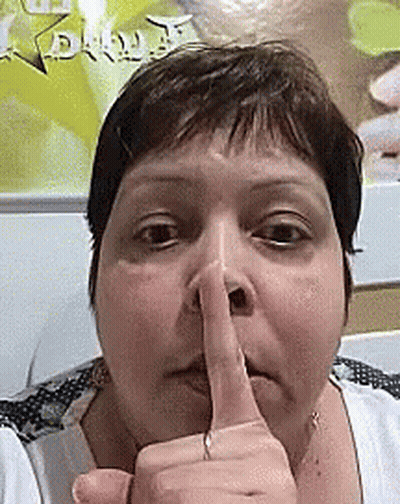 Woman Making Shhh Sign GIF