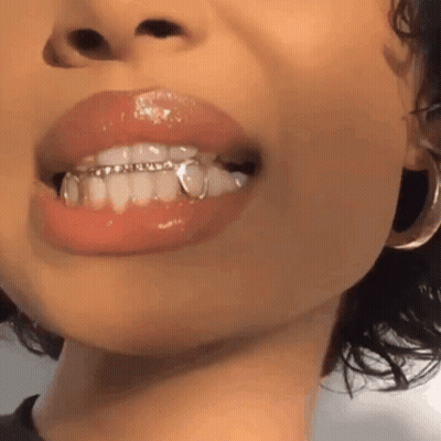 Woman Mouth With Grills And Earrings GIF