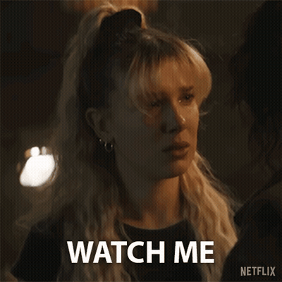 Woman Next To Man Saying Watch Me GIF