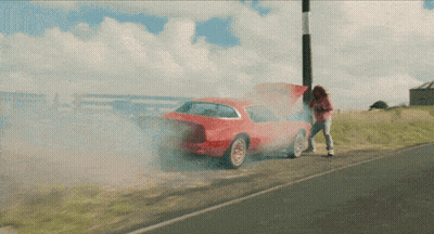 Woman Next To Red Car With Hood Up GIF