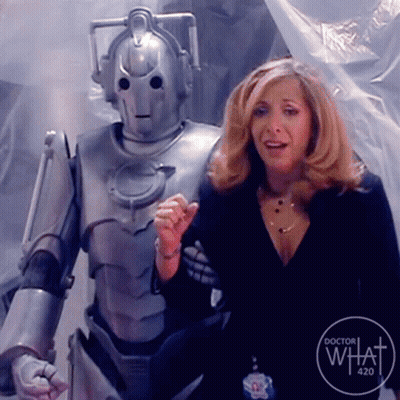 Woman Next To Robot With Doctor What 420 Logo GIF