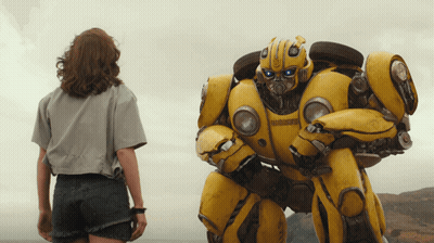 Woman Next To Yellow Robot Saying Bumblebee GIF