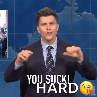 Woman On Bed Hands Up Saying You Suck GIF