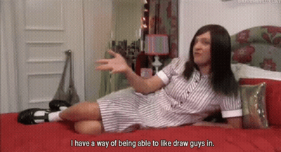 Woman On Bed Saying She Can Draw Guys GIF