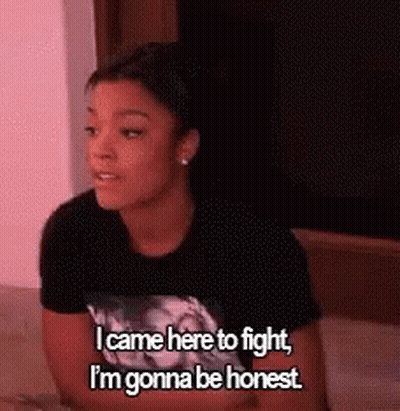 Woman On Bed Talking About Fighting GIF