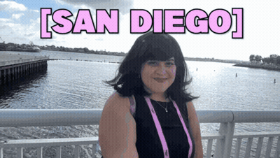 Woman On Bridge Overlooking San Diego GIF