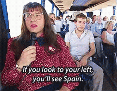 Woman On Bus Talking Into Microphone Saying If You Look To Your Left You'll See Spain GIF