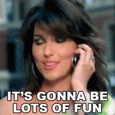 Woman On Cell Phone Saying It's Gonna Be Lots Of Fun GIF