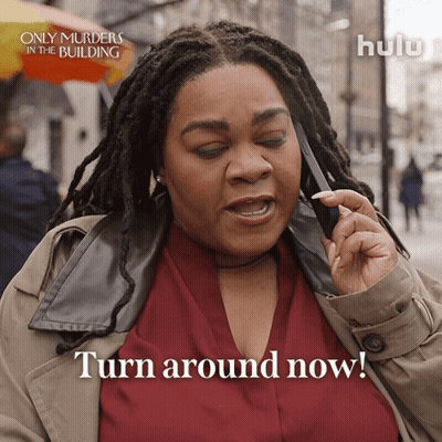Woman On Cell Phone Saying Turn Around Now GIF