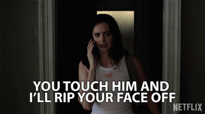 Woman On Cell Phone Saying You Touch Him And I'll Rip Your Face Off GIF
