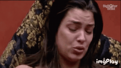 Woman On Couch Making Funny Face GIF