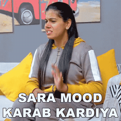 Woman On Couch Making Funny Face Sara Mood Karab Kardiya GIF