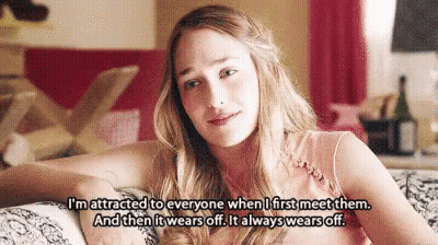 Woman On Couch Saying Attracted To Everyone GIF