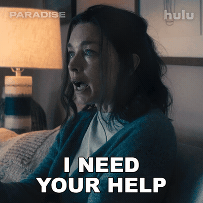 Woman On Couch Saying I Need Your Help GIF