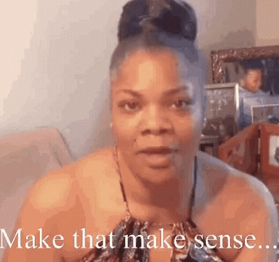 Woman On Couch Saying Make That Make Sense GIF