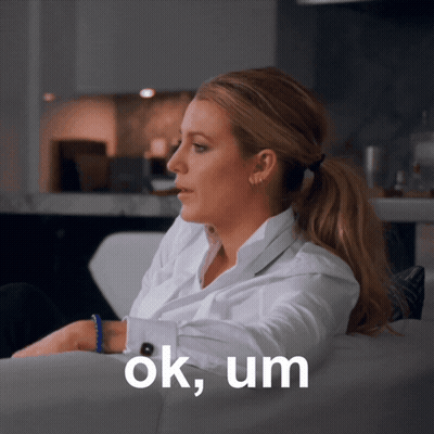 Woman On Couch Saying Ok Um GIF