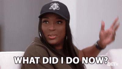 Woman On Couch Saying What Did I Do Now GIF