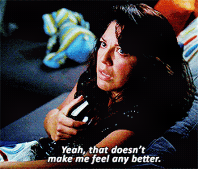 Woman On Couch Saying Yeah That Doesn't Make Me Feel Better GIF