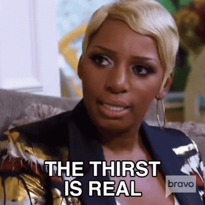 Woman On Couch Says The Thirst Is Real GIF