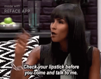 Woman On Couch Talking Wearing Lipstick GIF