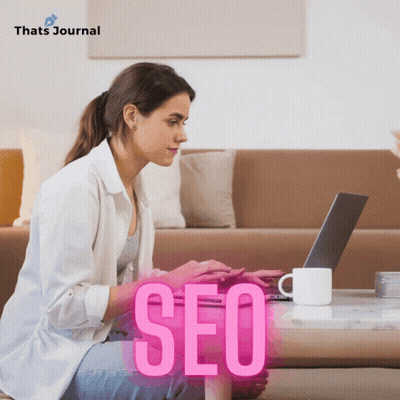 Woman On Couch Using Laptop SEO GIF