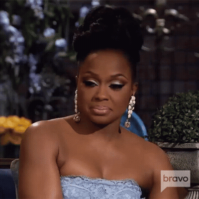 Woman On Couch With Bravo Logo GIF