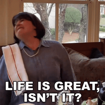 Woman On Couch With Towel Saying Life Is Great Isn't It GIF
