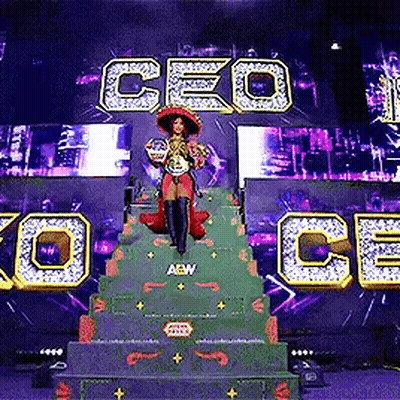 Woman On Green Staircase In Front Of CEO Screen GIF