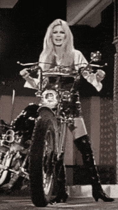 Woman On Motorcycle With License Plate Saying A GIF