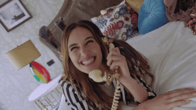 Woman On Phone Smiling GIF