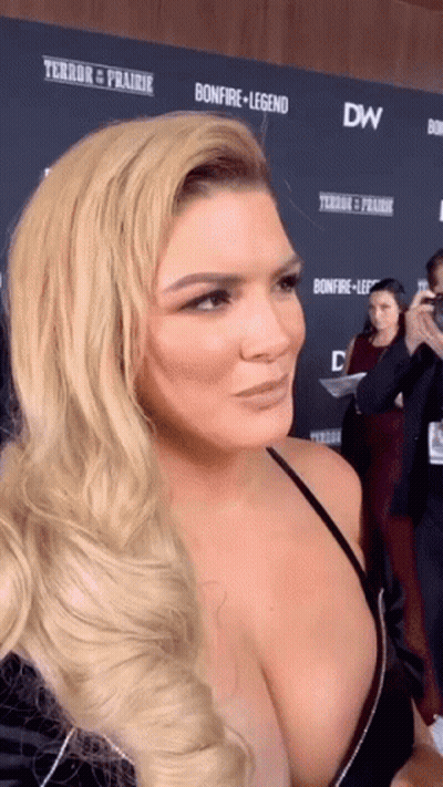 Woman On Red Carpet With Terror Prairie And Bonfire Legend GIF