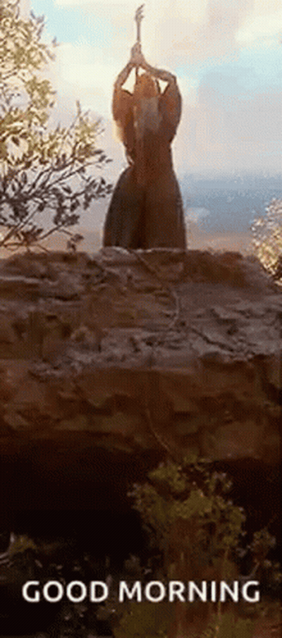 Woman On Rock Holding Guitar And Sword GIF