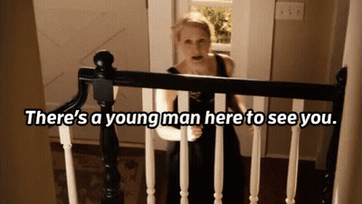 Woman On Staircase There's A Young Man Here To See You GIF