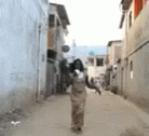 Woman On The Streets Making Announcement On Megaphone GIF