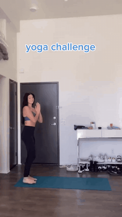 Woman On Yoga Mat With Yoga Challenge Sign GIF