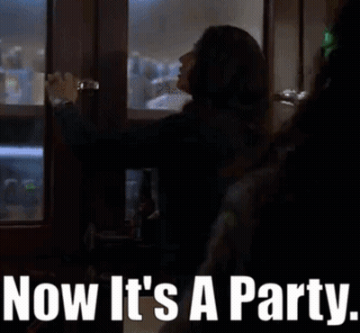 Woman Opening Door Saying Now It's A Party GIF