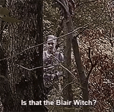 Woman Peeking Behind Tree Blair Witch GIF