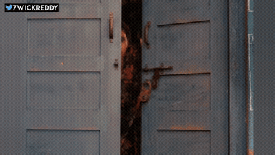 Woman Peeking Out Door 7Wickreddy GIF