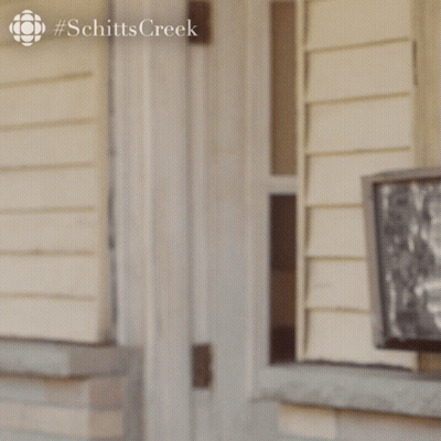 Woman Peeking Out Of Door #Schittscreek GIF