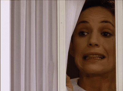 Woman Peeking Out Window Mouth Open GIF